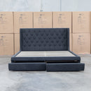 The Denmark Queen Fabric Storage Bed - Charcoal available to purchase from Warehouse Furniture Clearance at our next sale event.