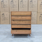 The Polo Marri Hardwood Timber Five Drawer Tallboy available to purchase from Warehouse Furniture Clearance at our next sale event.