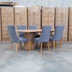 The Semillon Upholstered Natural Frame Dining Chair - Share Charcoal available to purchase from Warehouse Furniture Clearance at our next sale event.