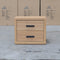 The Esca Two Drawer Bedside - Natural available to purchase from Warehouse Furniture Clearance at our next sale event.