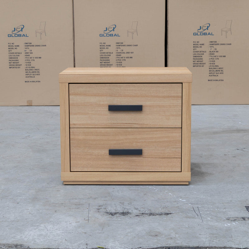 The Esca Two Drawer Bedside - Natural available to purchase from Warehouse Furniture Clearance at our next sale event.