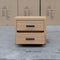 The Esca Two Drawer Bedside - Natural available to purchase from Warehouse Furniture Clearance at our next sale event.