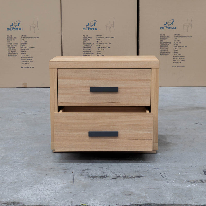 The Esca Two Drawer Bedside - Natural available to purchase from Warehouse Furniture Clearance at our next sale event.