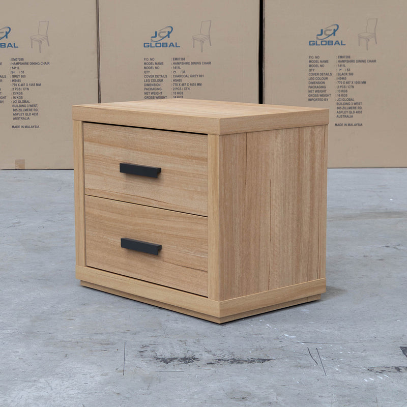The Esca Two Drawer Bedside - Natural available to purchase from Warehouse Furniture Clearance at our next sale event.