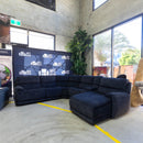The EXP-11930PRY Modular Corner Suite with Electric Recliner - Charcoal available to purchase from Warehouse Furniture Clearance at our next sale event.