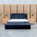 The Elm Double Upholstered Bed - Black available to purchase from Warehouse Furniture Clearance at our next sale event.