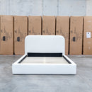 The Elm Double Upholstered Bed - Cream available to purchase from Warehouse Furniture Clearance at our next sale event.