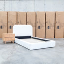 The Elm King Single Upholstered Bed - Cream available to purchase from Warehouse Furniture Clearance at our next sale event.