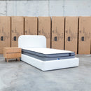 The Elm King Single Upholstered Bed - Cream available to purchase from Warehouse Furniture Clearance at our next sale event.