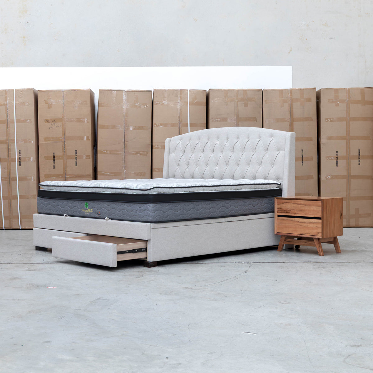 The Emily Double Fabric Gas Lift Storage Drawer Bed - Oat White available to purchase from Warehouse Furniture Clearance at our next sale event.