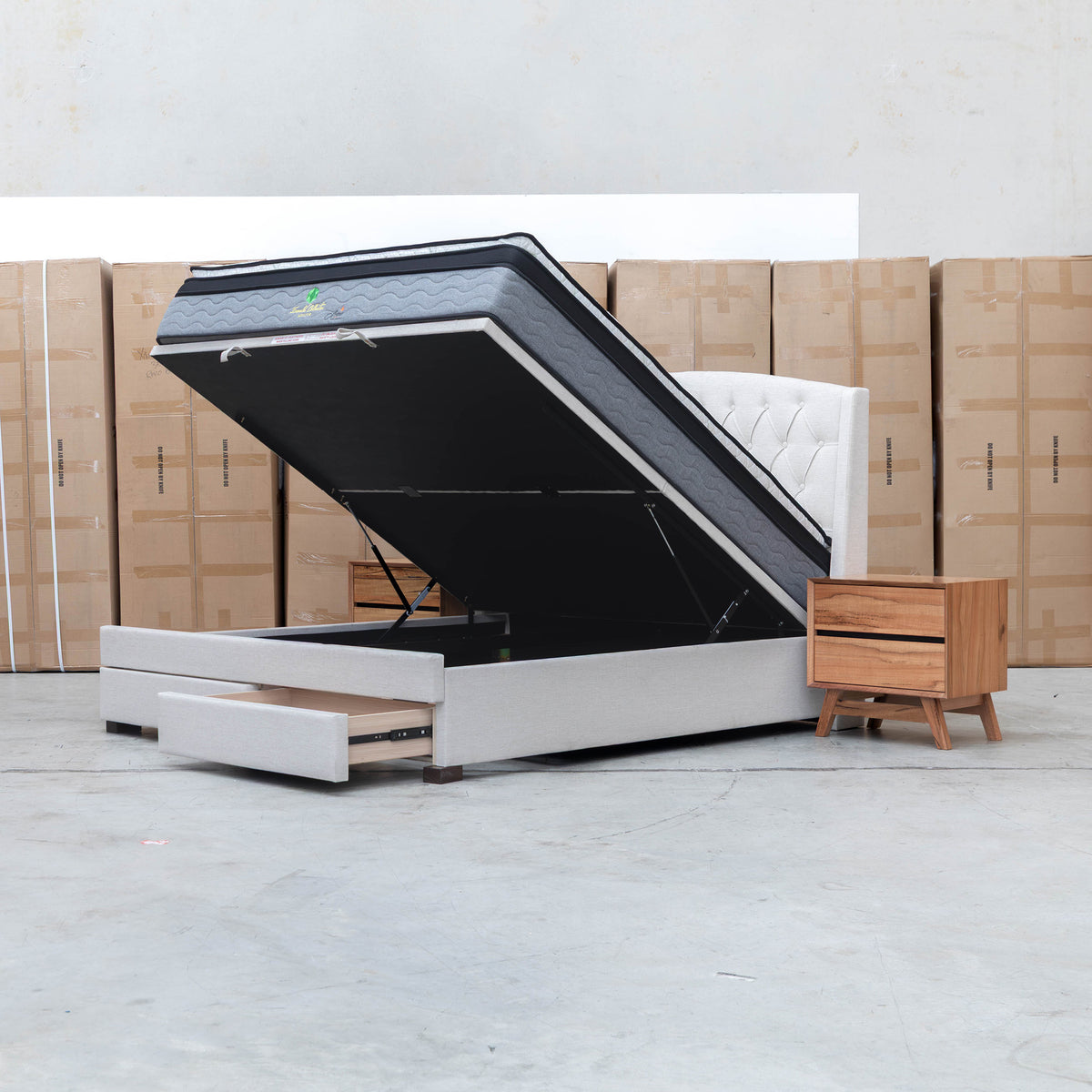 The Emily Double Fabric Gas Lift Storage Drawer Bed - Oat White available to purchase from Warehouse Furniture Clearance at our next sale event.