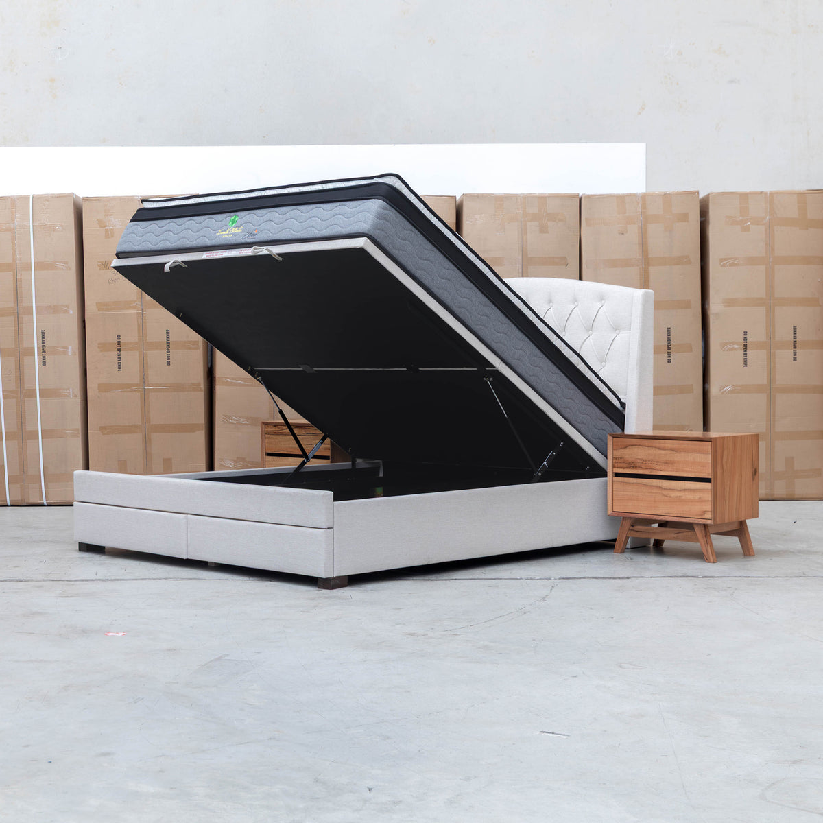The Emily King Fabric Gas Lift Storage Drawer Bed - Oat White available to purchase from Warehouse Furniture Clearance at our next sale event.