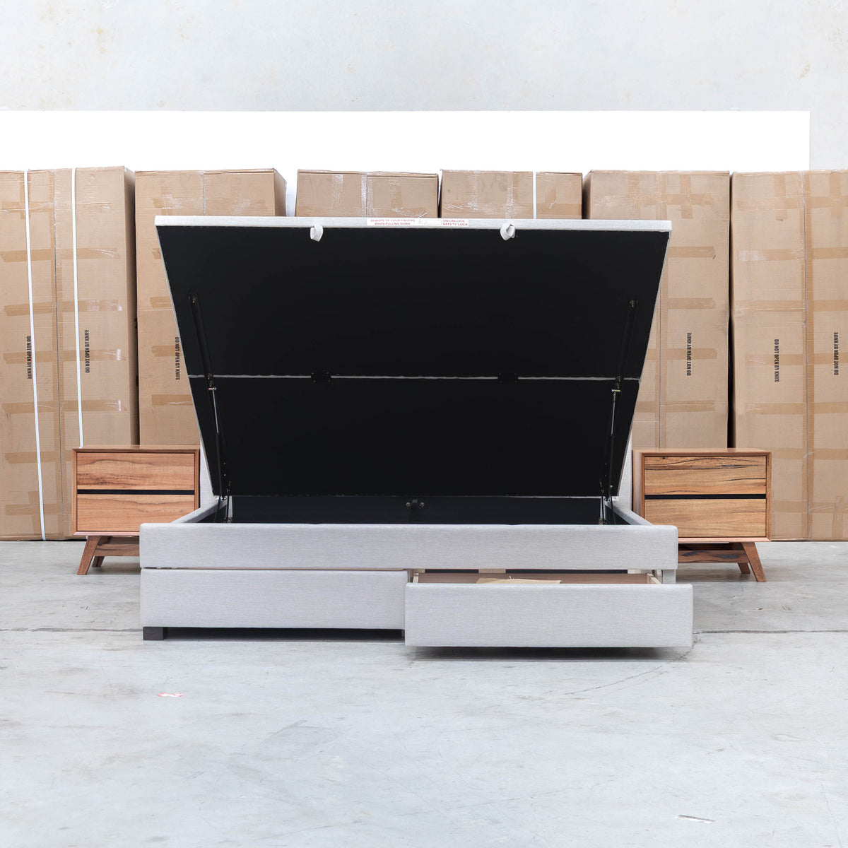 The Emily Double Fabric Gas Lift Storage Drawer Bed - Oat White available to purchase from Warehouse Furniture Clearance at our next sale event.