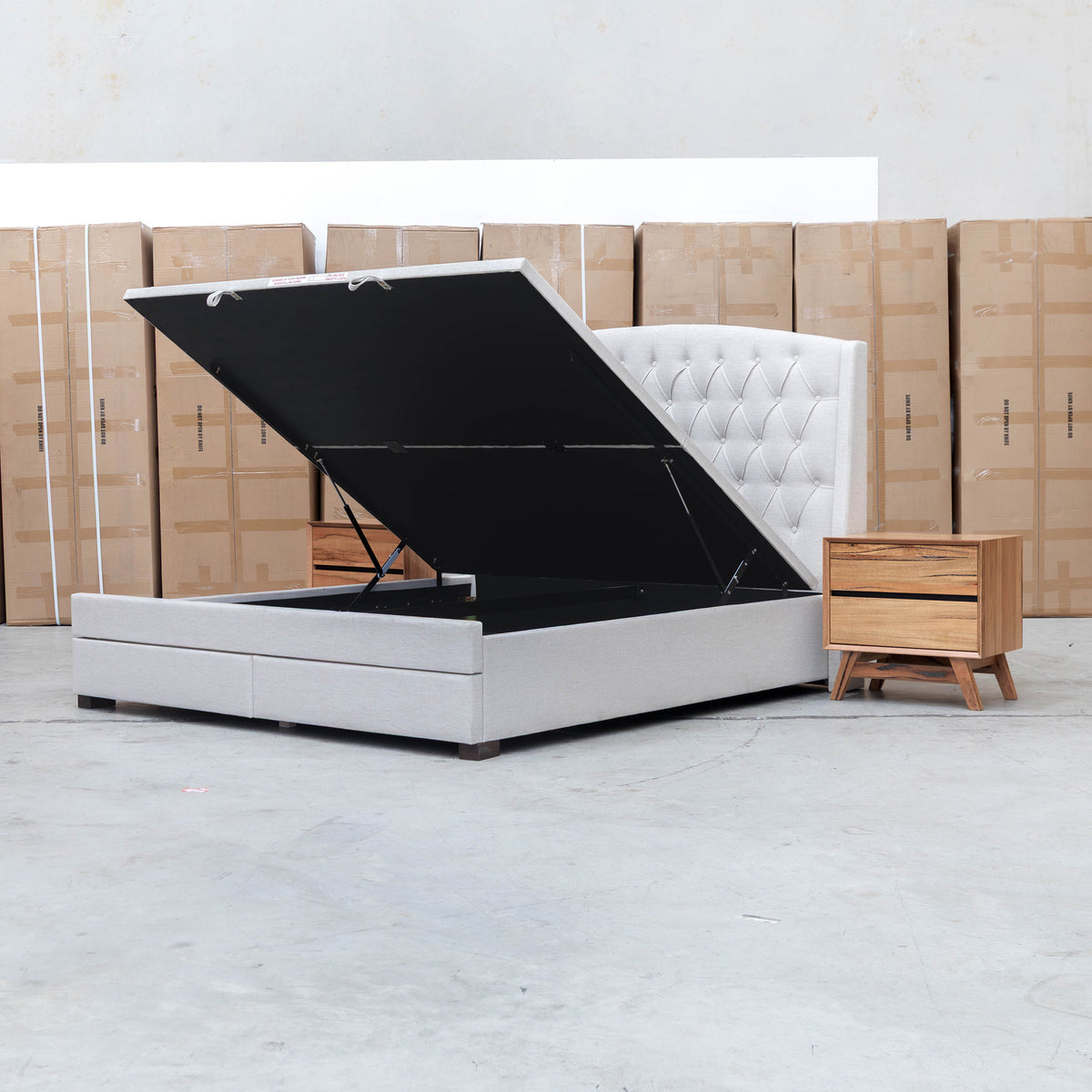 The Emily Double Fabric Gas Lift Storage Drawer Bed - Oat White available to purchase from Warehouse Furniture Clearance at our next sale event.