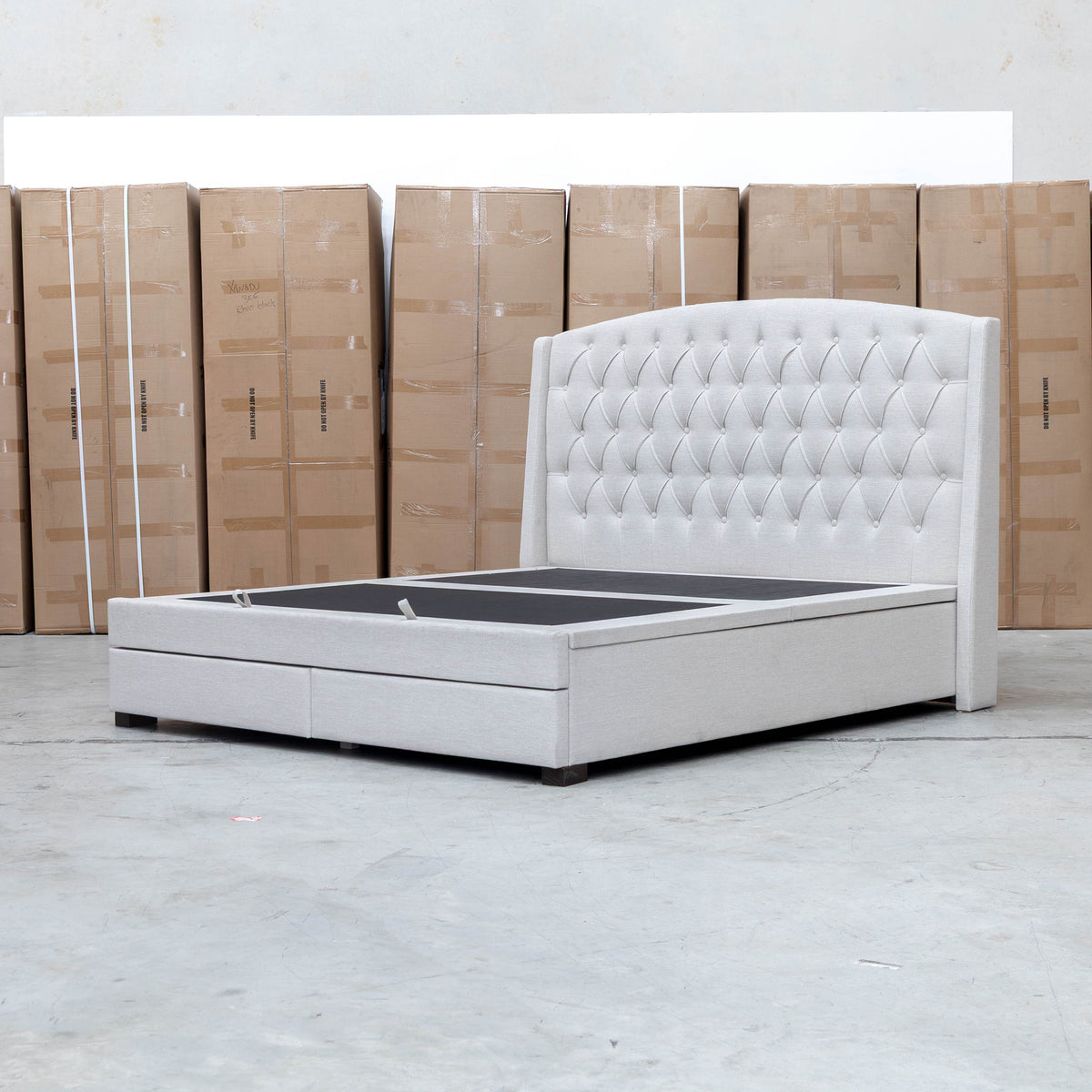 The Emily Double Fabric Gas Lift Storage Drawer Bed - Oat White available to purchase from Warehouse Furniture Clearance at our next sale event.