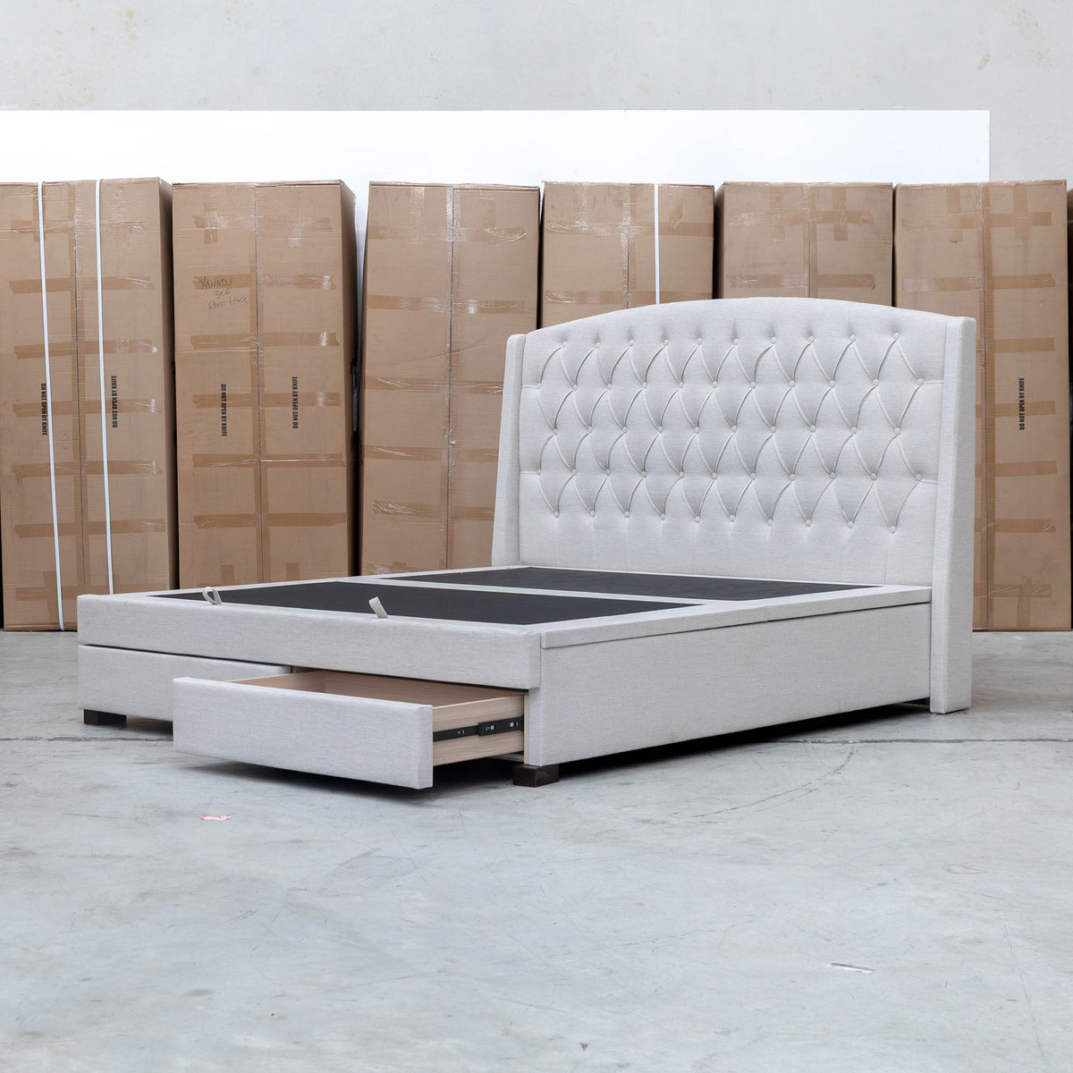 The Emily Double Fabric Gas Lift Storage Drawer Bed - Oat White available to purchase from Warehouse Furniture Clearance at our next sale event.