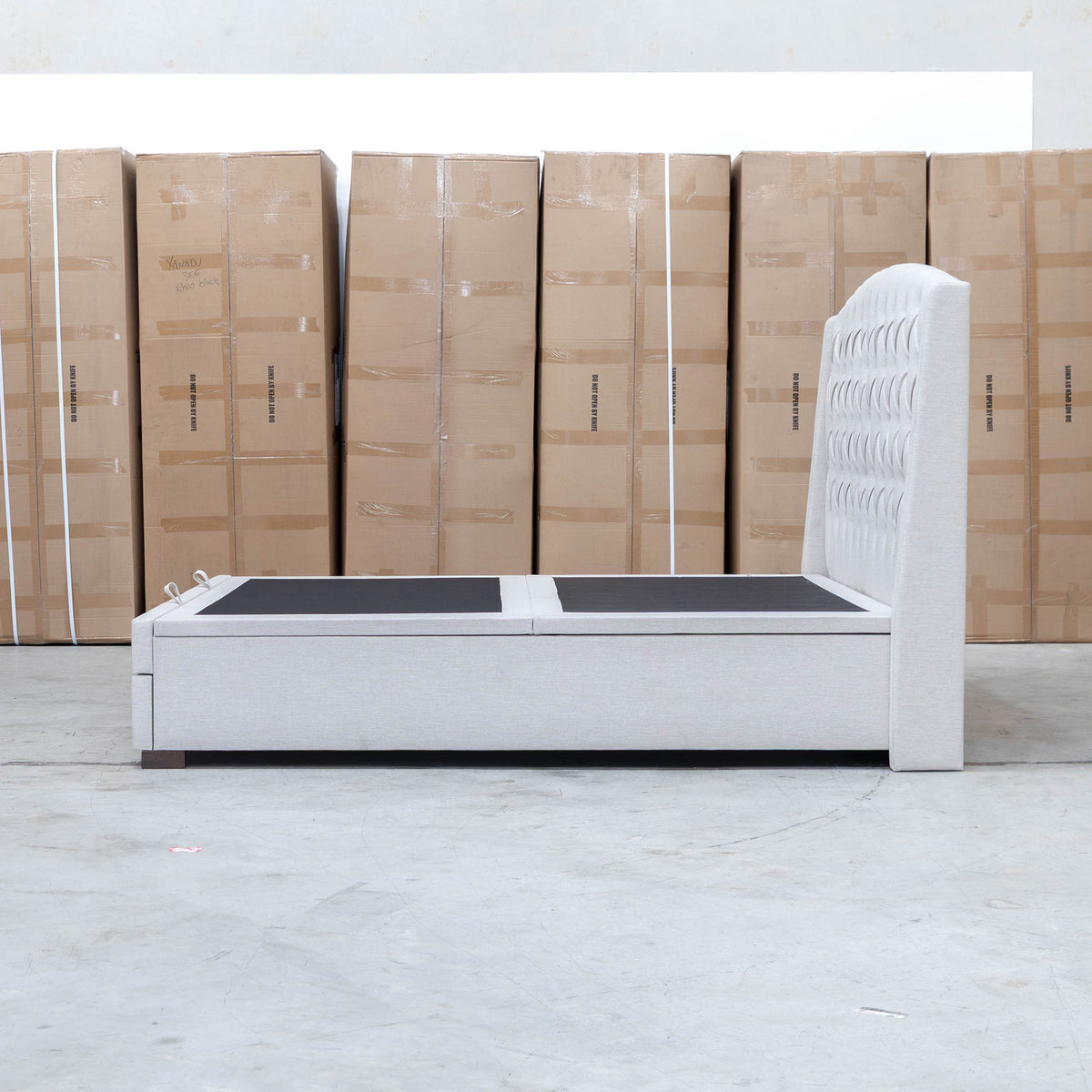 The Emily Double Fabric Gas Lift Storage Drawer Bed - Oat White available to purchase from Warehouse Furniture Clearance at our next sale event.