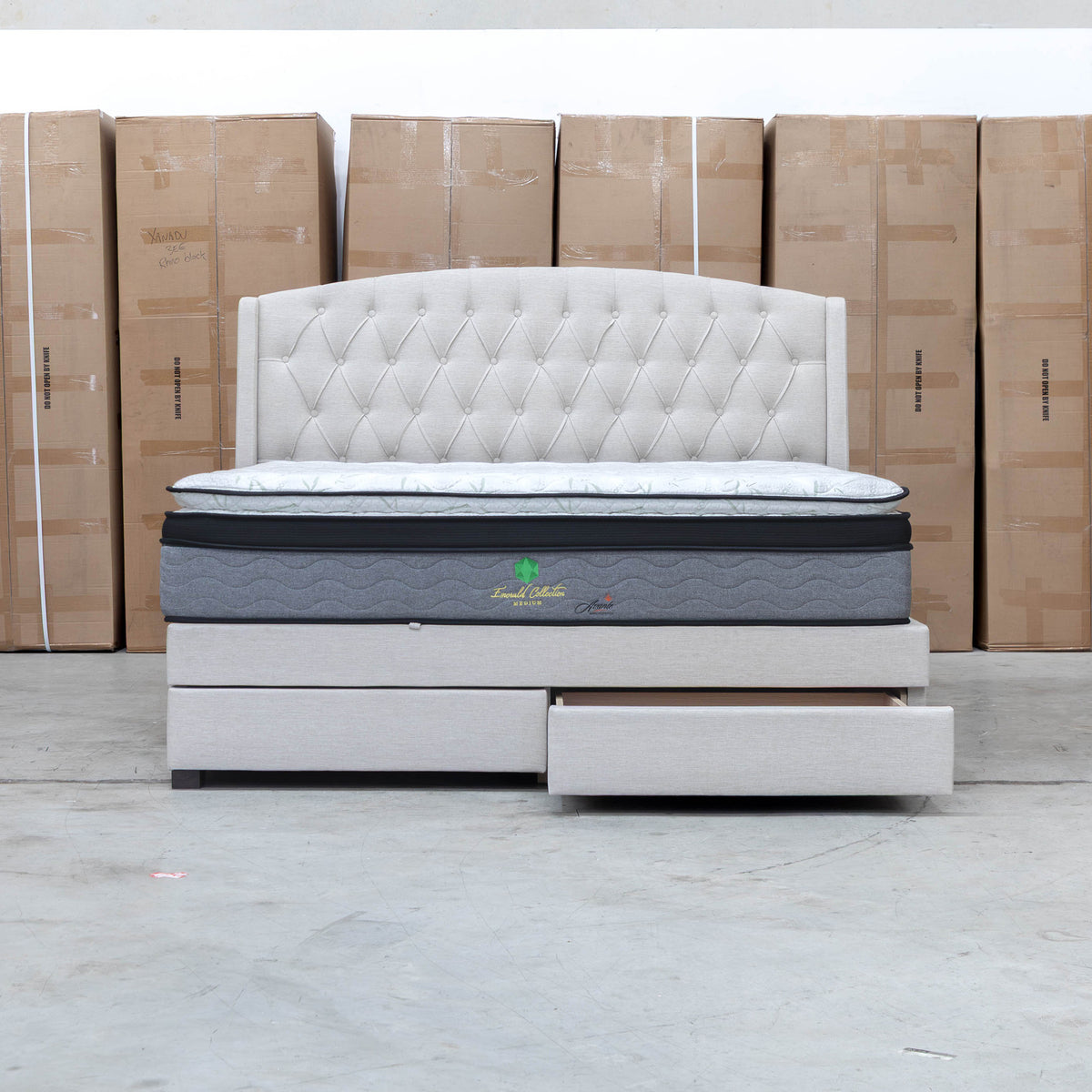 The Emily King Fabric Gas Lift Storage Drawer Bed - Oat White available to purchase from Warehouse Furniture Clearance at our next sale event.