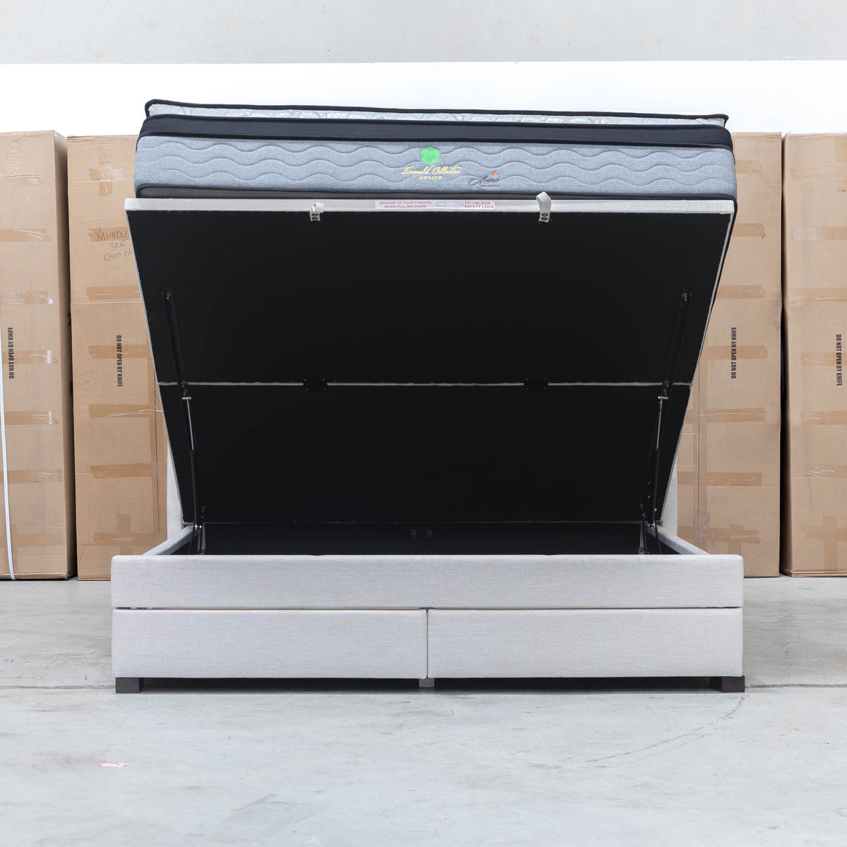 The Emily King Fabric Gas Lift Storage Drawer Bed - Oat White available to purchase from Warehouse Furniture Clearance at our next sale event.