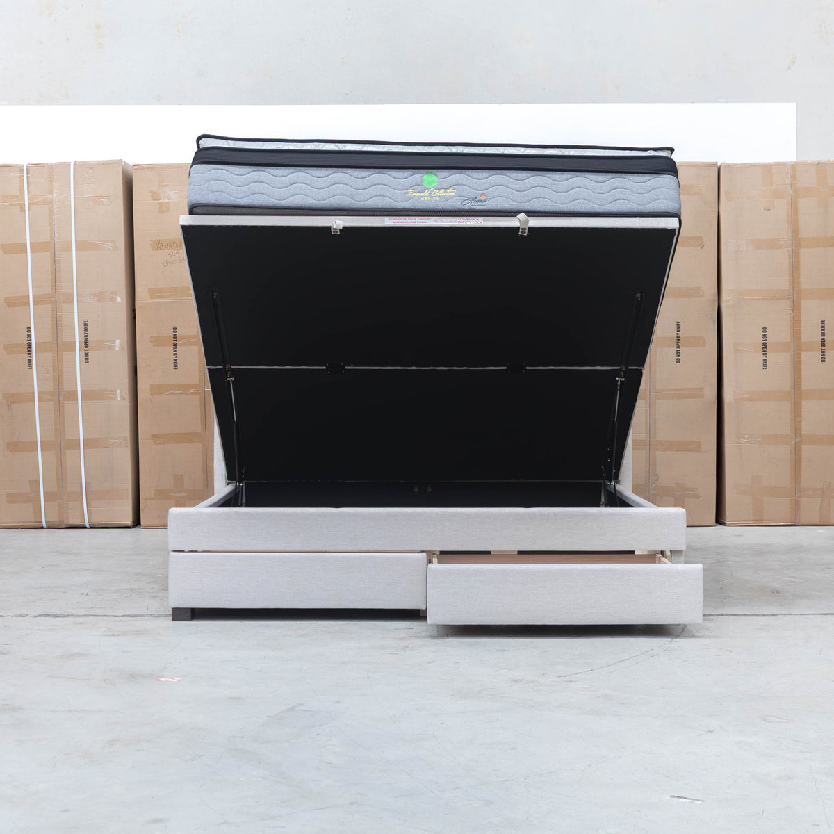 The Emily King Fabric Gas Lift Storage Drawer Bed - Oat White available to purchase from Warehouse Furniture Clearance at our next sale event.