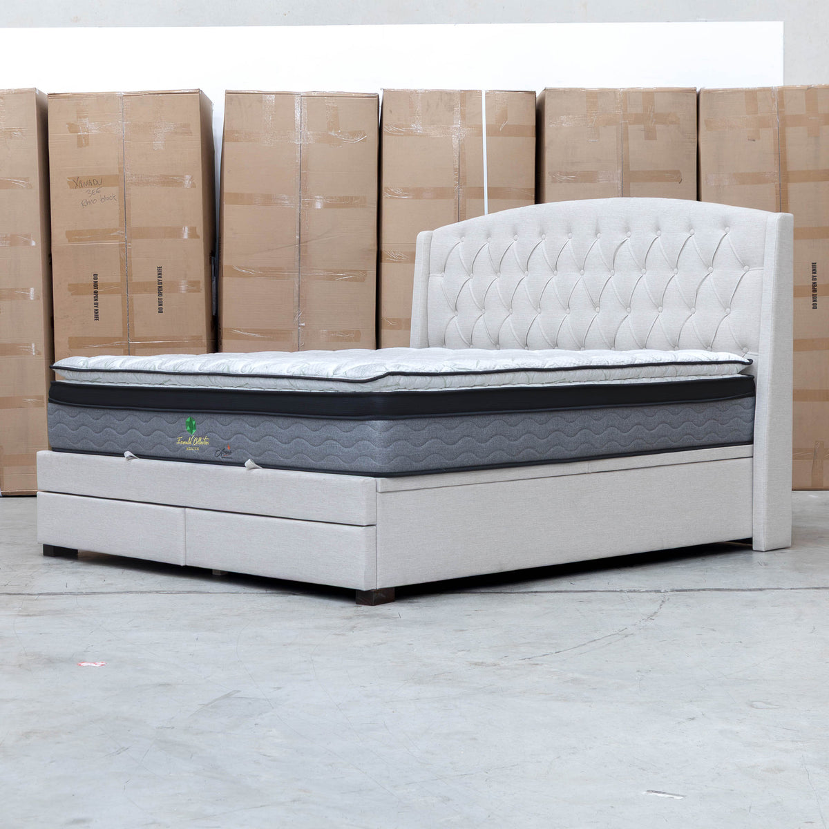 The Emily King Fabric Gas Lift Storage Drawer Bed - Oat White available to purchase from Warehouse Furniture Clearance at our next sale event.