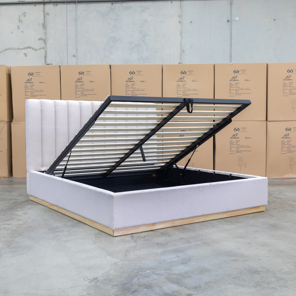 The Esperance King Fabric Gas Lift Storage Bed - Beige available to purchase from Warehouse Furniture Clearance at our next sale event.