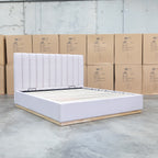 The Esperance King Fabric Gas Lift Storage Bed - Beige available to purchase from Warehouse Furniture Clearance at our next sale event.