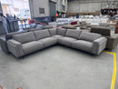 The HTL-12750 Corner Lounge Suite - Light Grey - Floor Stock available to purchase from Warehouse Furniture Clearance at our next sale event.