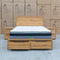 The Newfarm Distressed Oak Queen Storage Bed - Available after 6th November available to purchase from Warehouse Furniture Clearance at our next sale event.