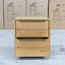The Newfarm Distressed Oak Two Drawer Hardwood Bedside available to purchase from Warehouse Furniture Clearance at our next sale event.