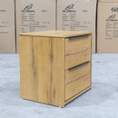The Newfarm Distressed Oak Two Drawer Hardwood Bedside available to purchase from Warehouse Furniture Clearance at our next sale event.