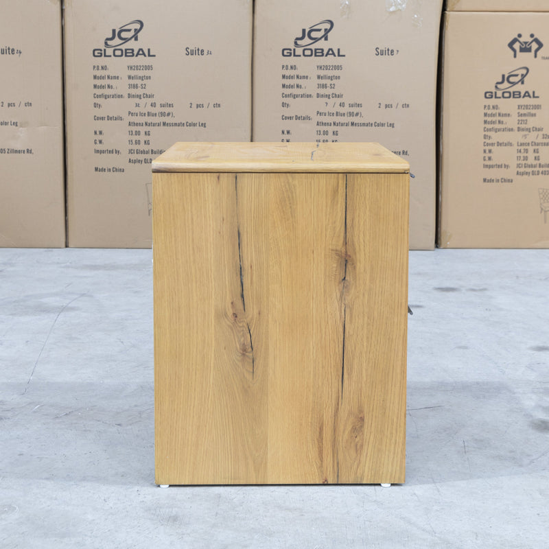 The Newfarm Distressed Oak Two Drawer Hardwood Bedside available to purchase from Warehouse Furniture Clearance at our next sale event.