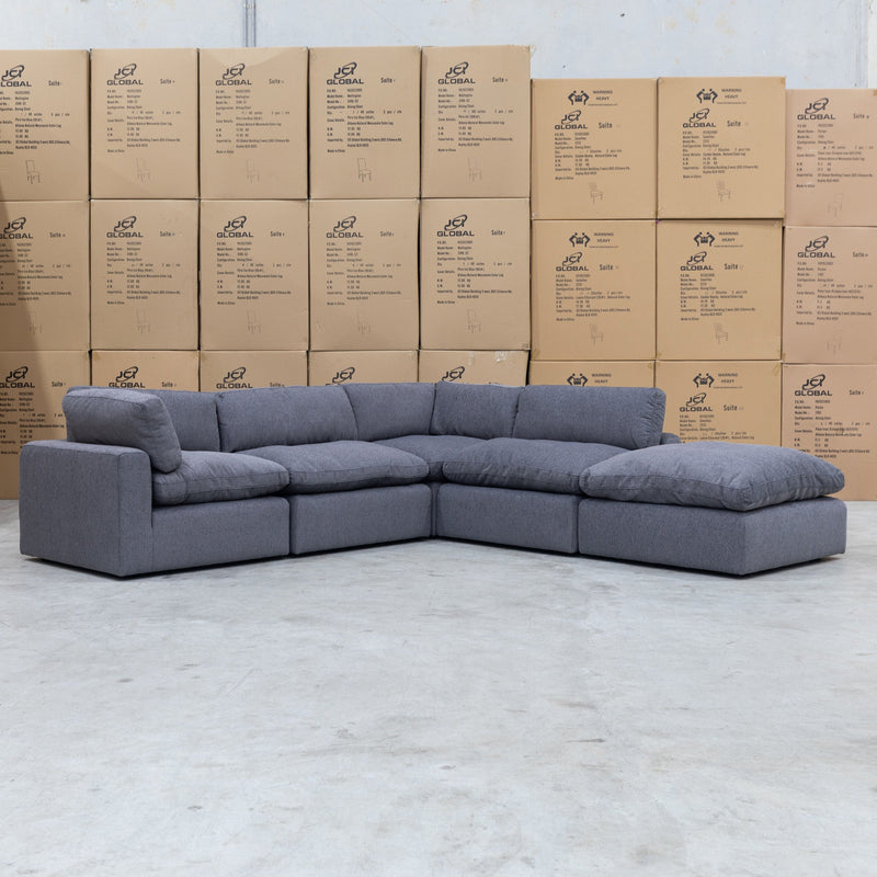 The Palermo Feather & Foam Modular Corner Lounge With Ottoman - Graphite available to purchase from Warehouse Furniture Clearance at our next sale event.