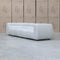 The Fara Curved Fabric Four Seat Sofa - Cloud available to purchase from Warehouse Furniture Clearance at our next sale event.