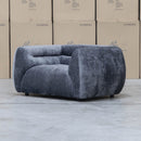 The Fara Curved Fabric Armchair - Steel available to purchase from Warehouse Furniture Clearance at our next sale event.