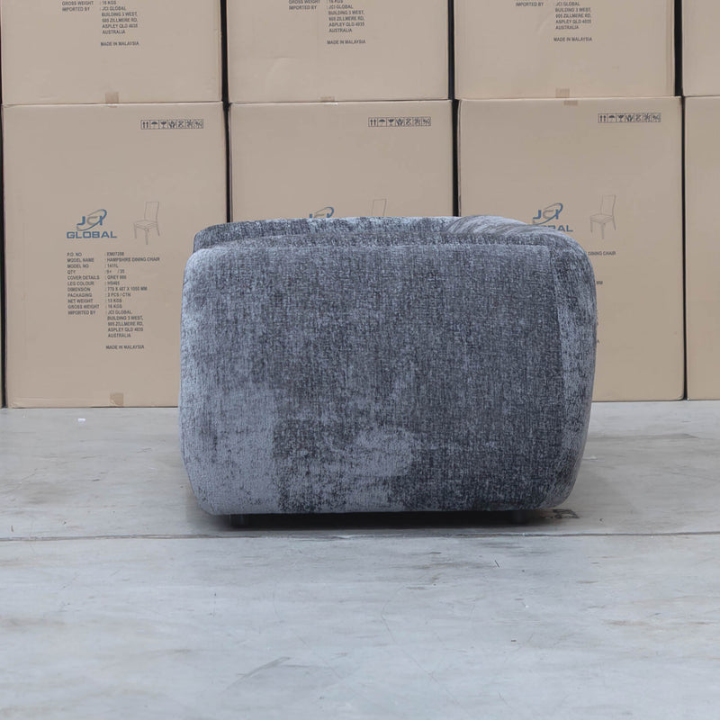 The Fara Curved Fabric Three Seat Sofa - Steel available to purchase from Warehouse Furniture Clearance at our next sale event.