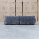 The Fara Curved Fabric Three Seat Sofa - Steel available to purchase from Warehouse Furniture Clearance at our next sale event.