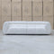 The Fara Curved Fabric Three Seat Sofa - Cloud available to purchase from Warehouse Furniture Clearance at our next sale event.