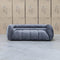 The Fara Curved Fabric Two Seat Sofa - Steel available to purchase from Warehouse Furniture Clearance at our next sale event.