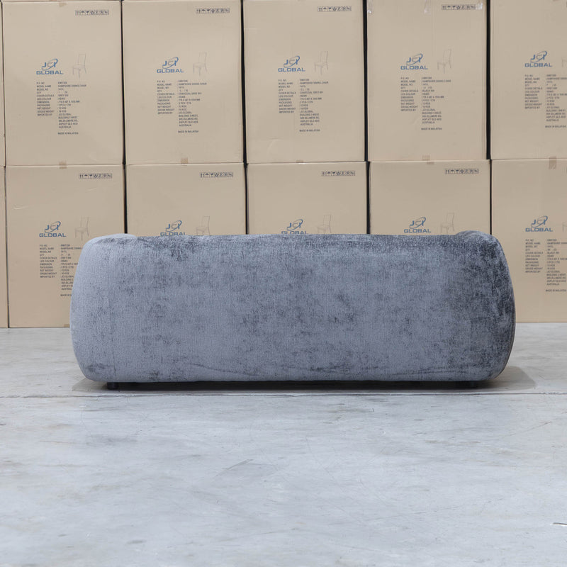 The Fara Curved Fabric Two Seat Sofa - Steel available to purchase from Warehouse Furniture Clearance at our next sale event.