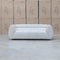 The Fara Curved Fabric Two Seat Sofa - Cloud available to purchase from Warehouse Furniture Clearance at our next sale event.