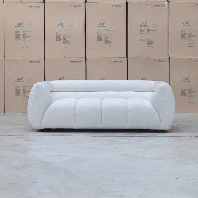 The Fara Curved Fabric Two Seat Sofa - Cloud available to purchase from Warehouse Furniture Clearance at our next sale event.