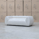 The Fara Curved Fabric Two Seat Sofa - Cloud available to purchase from Warehouse Furniture Clearance at our next sale event.
