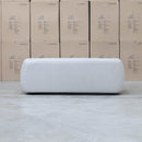 The Fara Curved Fabric Two Seat Sofa - Cloud available to purchase from Warehouse Furniture Clearance at our next sale event.