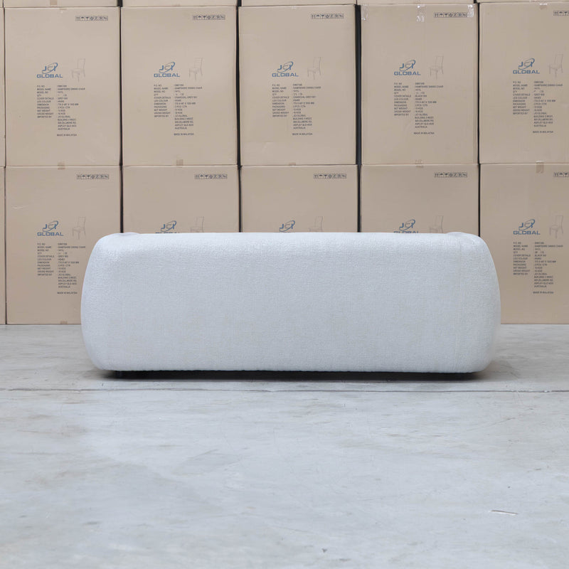 The Fara Curved Fabric Two Seat Sofa - Cloud available to purchase from Warehouse Furniture Clearance at our next sale event.