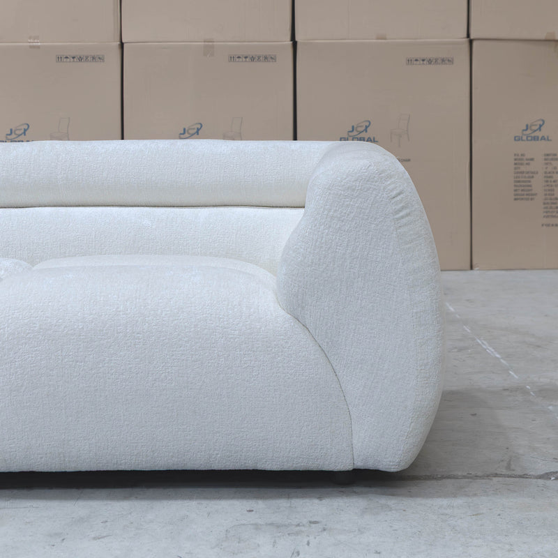 The Fara Curved Fabric Two Seat Sofa - Cloud available to purchase from Warehouse Furniture Clearance at our next sale event.