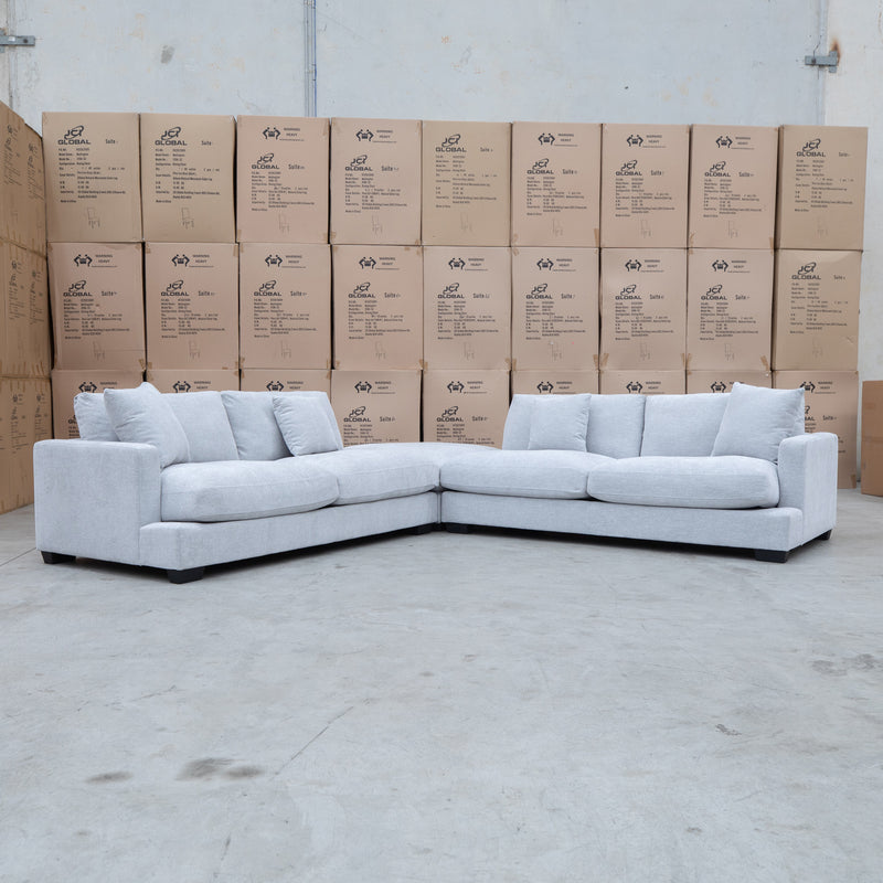 The Fate Deep Seat Feather & Foam Modular Corner Ottoman Suite - Bluefox available to purchase from Warehouse Furniture Clearance at our next sale event.