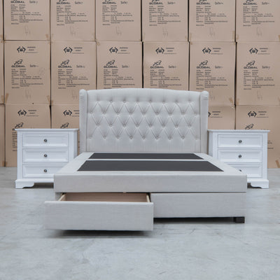 The Amelia King Fabric Gas Lift Storage Drawer Bed - Oat White - Available After 10th October available to purchase from Warehouse Furniture Clearance at our next sale event.