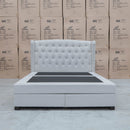 The Amelia Queen Fabric Gas Lift Storage Drawer Bed - Oat White - Available After 10th October available to purchase from Warehouse Furniture Clearance at our next sale event.