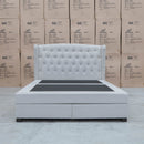 The Amelia Queen Fabric Gas Lift Storage Drawer Bed - Oat White available to purchase from Warehouse Furniture Clearance at our next sale event.